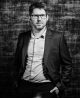 Simon returns to boost leadership team