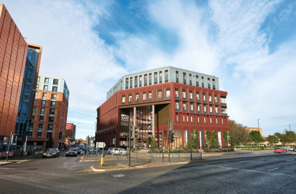 Construction milestone for university’s new business school