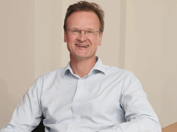 Firm plans to increase investment after reaching £2bn landmark