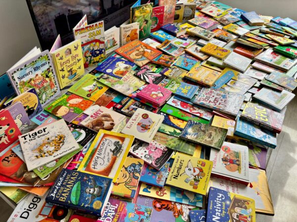 Law firm gets on the case with children’s book appeal donations